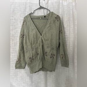 Button up sweater with flower cut out design
